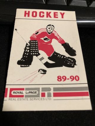 1989 - 90 Calgary Flames Hockey Pocket Schedule Royal LePage Real Estate Version 2