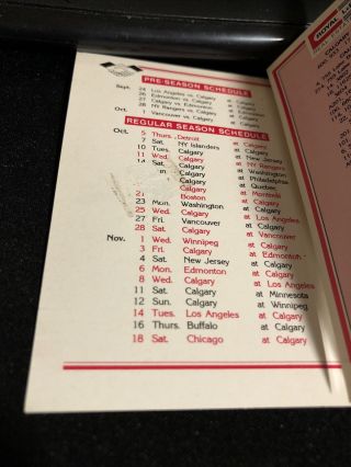 1989 - 90 Calgary Flames Hockey Pocket Schedule Royal LePage Real Estate Version 3