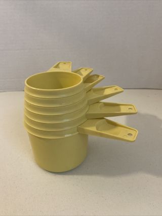 Vintage Tupperware Set Of 6 Yellow Measuring Cups -