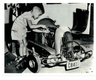 Vintage B&w Publicity Photo Boy On Small Race Car