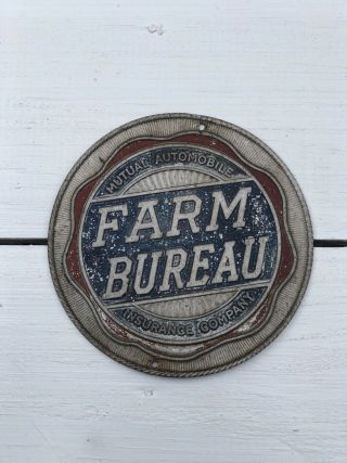 Vintage Farm Bureau Mutual Automobile Insurance Co.  License Plate Badge