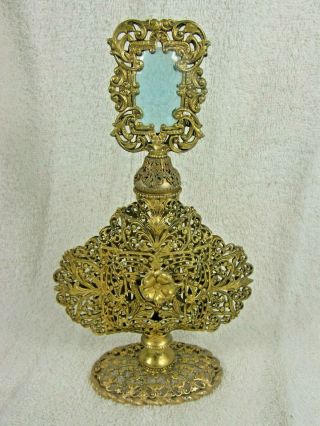 Vintage V.  Ornate Metal Perfume Bottle Blue Glass Jewel Stopper Gold Rose Design
