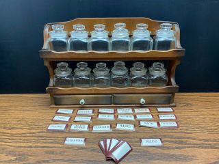 Vintage Wall Mount Wood Spice Rack W 12 Clear Glass Canister Style Jars & Labels