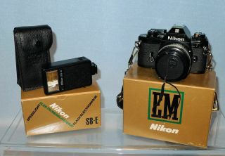 Vintage Nikon Em Slr Film Camera With 50mm Lens And Flash
