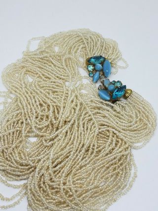 Vintage Multi Strand Clear Glass Seed Bead Necklace Blue Rhinestone Closure