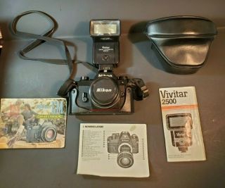 Vintage Nikon Em Camera With Leather Cover And Flash Attachment.
