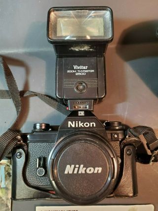 Vintage Nikon EM Camera with Leather Cover and Flash Attachment. 3