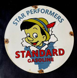 Vintage 1960’s Star Standard Pinocchio 12” Porcelain Sign Car Truck Oil Gas