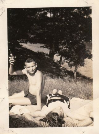 2 Vintage Photos Boy Holds Soda Bottle By Sleeping Woman Woman Swimsuit On Beach