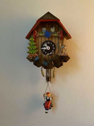 Vintage Colorful Small Cuckoo Clock By Mfg.  Co.  Inc.  German Woman On Swing & Key
