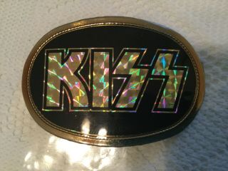 Kiss Vintage 1977 Gold Prism Belt Buckle Black Background Pacifica Mfg