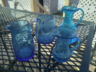 Vintage Antique Blenko Group Of 4 Blue Crackle Glass Handled Pitchers