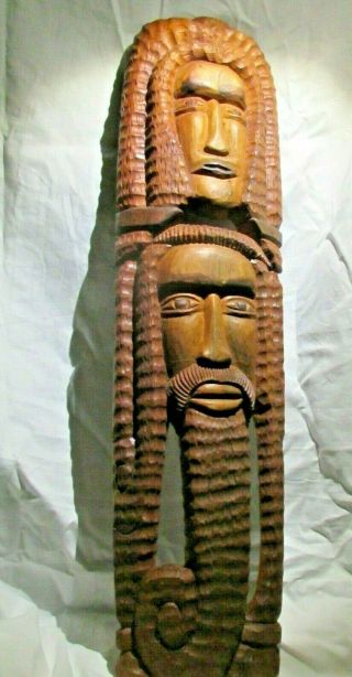 25.  5 " Large Hand Carved Natural Wood Grain Jamaican Folk Art Heads Wall Plaque
