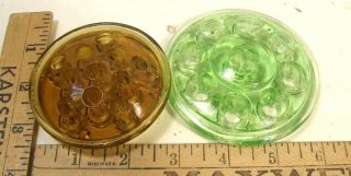 2 Vintage Round Molded Glass Flower Arranging Frogs 3.  5 " Green 3 " Amber