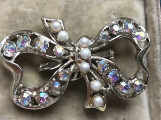 Vintage 50’s Aurora Borealis Glass Stone & Faux Pearl Bow Silver Tone Brooch