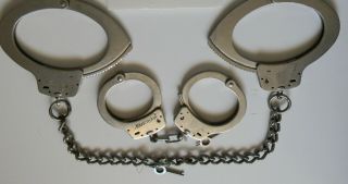 VTG SMITH & WESSON S&W M - 100 HANDCUFFS & M - 1900 LEG IRONS,  FORMER CALI SHERIFF 2