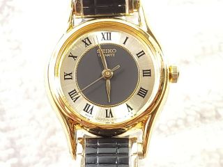 Vintage Seiko Quartz Watch Black Gold Tone Roman Numerals Women 