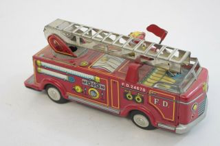Vintage Tin Friction Fire Truck Made In Japan Tn Nomura Toy Ladder Truck