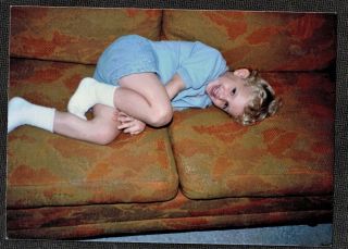 Vintage Photograph Cute Little Boy Laying On Couch