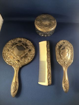 Vintage 4 Piece Dresser Set Comb,  Brush,  Hand Mirror,  Powder Jar.
