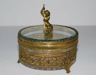 Gold Ormolu Filgree Trinket Jewelry Box Beveled Glass Top Cupid Cherub Finial