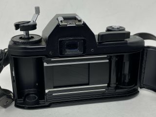 Vintage Nikon EM Camera Series E 50mm 1:1.  8 with Lens 2