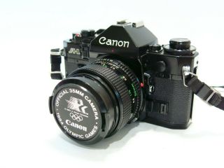 Xlnt Canon A - 1 35mm Film Camera & 50mm 1:1.  4 Lens,  Mirror Bumper,  No Squeal
