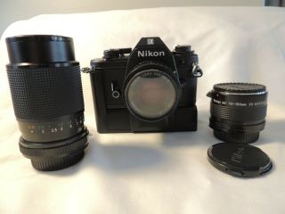Nikon Em 35mm Slr Film Camera Body With 2 Lenses,  Nikon Case And Auto Winder