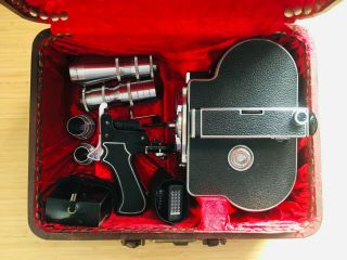 Bolex H16 Non - Reflex,  4x Wollensak Lens,  Pistol Grip,  Rewind Crank,  & Case.