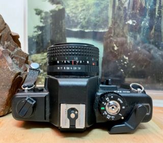 Praktica BX10 DX vintage SLR camera with Pentacon 1,  8 50 MM MC 4