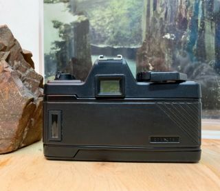 Praktica BX10 DX vintage SLR camera with Pentacon 1,  8 50 MM MC 5