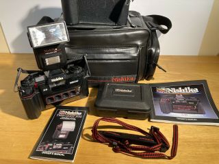 Nishika N8000 35mm 3d Stereo Film Camera With Nishika Accessories,  Cleaner,  Bag