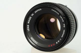 Canon Fd 100mm 1:2.  8 S.  S.  C.  Lens,  Lens Hood And Cap