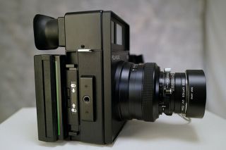 Polaroid 600 Medium Format Camera W/mamiya 127mm F/4,  7 Lens & Cartridge