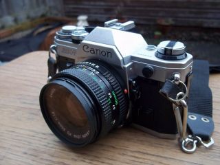 Canon Ae - 1 35mm Slr Film Camera. ,  Accs.