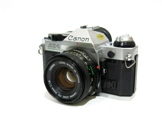 , Canon Ae - 1 Program 35mm Film Camera W/ 50mm 1:1.  8 Lens - No Squeal