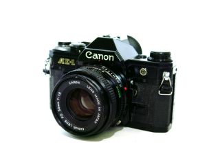 Professionally Serviced Canon Ae - 1 Program 35mm Film Camera W/ 50mm 1:1.  8 Lens