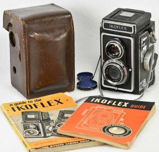 Zeiss Ikoflex Ia Tlr Camera,  Ikon F3.  5 75mm Lens,  Leather Case,  2 Guides