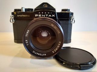 Black Pentax Spotmatic Sp W/35mm F/2.  8 Hanimex Lens.  Film.