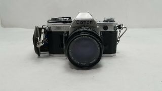 Canon Ae - 1 Program 35mm Slr Camera With 50mm F/1.  4