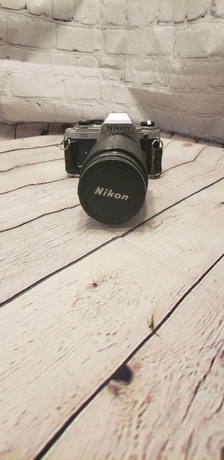 Vintage Nikon Fg Camera With Zoom Lens