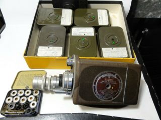 Bell & Howell Filmo Auto Master 16 W/ 3 Lens Turret W/11 16mm Magazines.