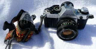 Canon Ae - 1 Slr Film Camera W/fd 50mm 1:1.  8 Zoom Lens & Shoulder Strap