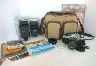 Canon Ae - 1 35 Mm Film Camera W/ 50mm Lens 2 Flashes & Case