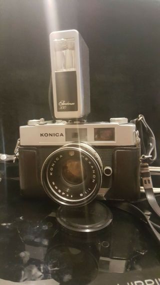 Konica Konica Auto S1.  6 W/hexanon 45mm,  Bonus Kodak Accessories | To See Photos