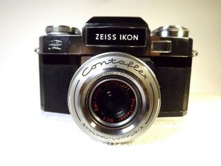 Vintage Zeiss Ikon Contaflex 35mm Film Slr Camera And Two Lenses.