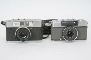 Half Frame Camera Pair: Olympus Pen - Ee 2,  Yashica 72 - E