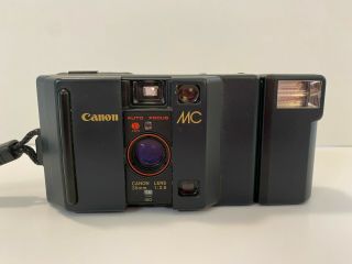 1984 Canon Mc 35mm F/2.  8 Auto Focus Point & Shoot Camera (film Rolls Incl. )