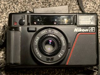 Nikon L35 Af 35mm F2.  8 Point And Shoot Camera With Wrist Strap