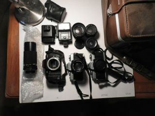 3 Minolta 35mm Film Cameras ; Assorted Lens And Flashes